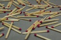 Scattered matches on a gray background Royalty Free Stock Photo