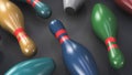 Scattered multi-colored bowling pins