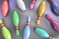 Scattered multi-colored bowling pins. Top view