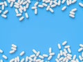 Scattered parmaceutical medicine pill tablets on the blue background. Mock up template. Health care concept. 3d render