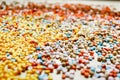 Scattered colorful plastic particles over a surface Royalty Free Stock Photo