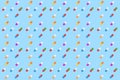 Colorful pattern of pills and capsules on a blue. Seamless pattern