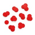 Scattered red circular objects on white background Royalty Free Stock Photo