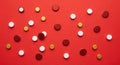Scattered Red Glitter and White Circles on Red Background Royalty Free Stock Photo