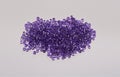 Scattered shiny purple seed beads
