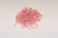 Scattered shiny rose seed beads