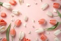 Scattered tulips on pink background. Mockup template with for congratulation, woman or mother day, easter, birthday Royalty Free Stock Photo