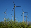 Scattered turbines in wind farm and blue sky Royalty Free Stock Photo