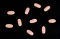 Scattered Unspecified Pink Pills Royalty Free Stock Photo