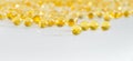 Scattered yellow transparent capsule fish oil