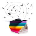 Scatteret letters flying from books and word dyslexia Royalty Free Stock Photo