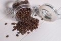 The scattering of coffee beans espresso of transparent banks