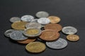 A scattering of coins on a black background Royalty Free Stock Photo