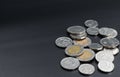 A scattering of coins on a black background Royalty Free Stock Photo