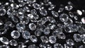a scattering of diamonds on a black background precious stones Royalty Free Stock Photo