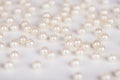 Scattering of fake pearls