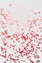 A scattering of red hearts on a white background. Texture for Valentine`s day Royalty Free Stock Photo