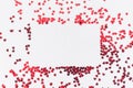 A scattering of red hearts on a white background. Texture for Valentine`s day Royalty Free Stock Photo