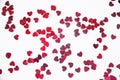 A scattering of red hearts on a white background. Texture for Valentine`s day Royalty Free Stock Photo