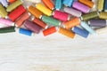 Multicolor sewing threads on white wooden background Royalty Free Stock Photo