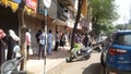 Scenario of streets with crowd near the shop in India