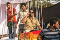 Scene with actors in policemen uniform playing corruption police department at traditional Goa carnival