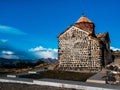 Scene of the ancient buildings Sevanavank Monastery on hill, blue sky background. Historical churches and cathedrals at the Royalty Free Stock Photo
