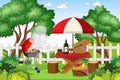 Scene with BBQ grill and food on picnic table in the park Royalty Free Stock Photo