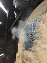 charcoal kiln containers where carbonization or burning of wood to produce pure carbon at factory Royalty Free Stock Photo