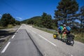 Scene of a couple of cyclists on tandem bicycle in La Garrotxa, Girona, Spain