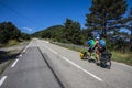 Scene of a couple of cyclists on tandem bicycle in La Garrotxa, Girona, Spain