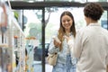 A female pharmacist talking with a female customer about a product Royalty Free Stock Photo