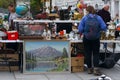 Scene from Flea market where people sell and buy used toys, clothes, pictures, kitchen ware and other vintage things