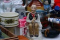 Scene from Flea market where people sell and buy used toys, clothes, pictures, kitchen ware and other vintage things Royalty Free Stock Photo