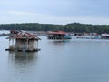 floating chalet and fish farm on the river Royalty Free Stock Photo