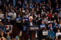 Scene from the heated rally of Bernie Sanders with the crowd holding banners actively cheering