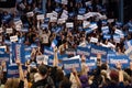 Scene from the heated rally of Bernie Sanders with the crowd holding banners actively cheering