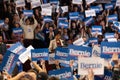 Scene from the heated rally of Bernie Sanders with the crowd holding banners actively cheering