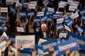 Scene from the heated rally of Bernie Sanders with the crowd holding banners actively cheering