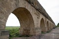 Roman aqua duct which is still in use to transport water Royalty Free Stock Photo