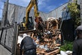 A scene of house demolition work.