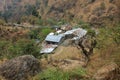 Suspension bridge and small hotels in Domen, Langtang National P