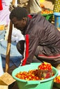 Scene life in the village market, authentic place and behaviour. Vibrant colors
