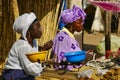 Scene life in the village market, authentic place and behaviour. Vibrant colors