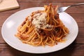 Spaghetti bolognese.I lifted the pasta which I put powder cheese on with a fork. Royalty Free Stock Photo