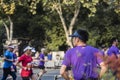 A male runner who turns around to visit his partner during a long run Royalty Free Stock Photo