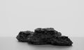 Scene with for mock up presentation with black coal stones as pedestals in minimalist style with copy space, 3d render abstract