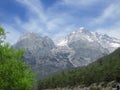 A scene of mountain peaks taken at the foot of Jade Dragon Snow Mountain Royalty Free Stock Photo