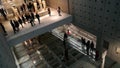 Scene from the New Acropolis Museum in Athens, Greece, with visitors looking at the archaeological exhibits, including the Karyati