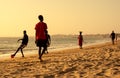 Scene of people men doing musculation sport on sand at beach during sunset in Africa, Senegal